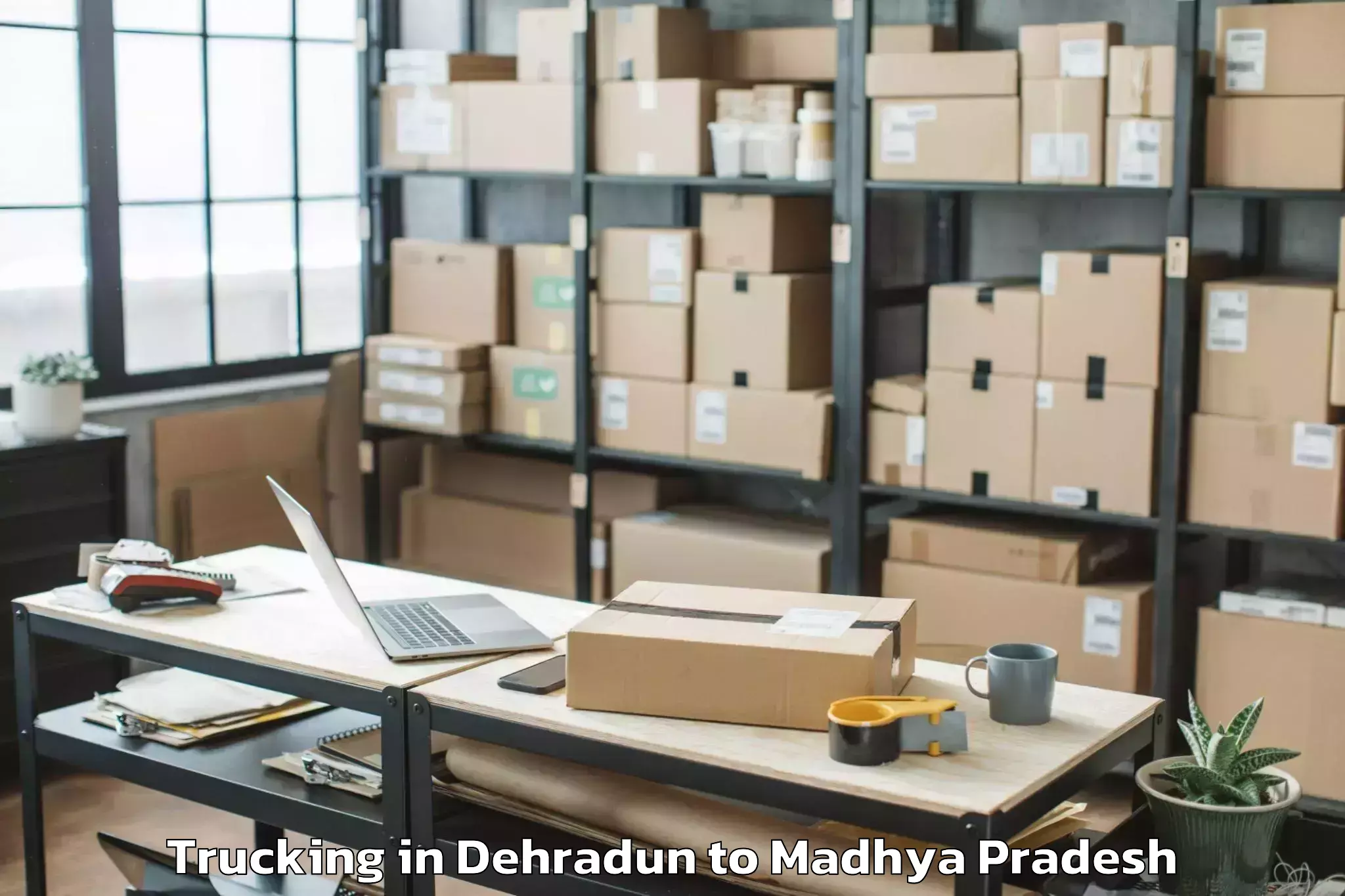 Top Dehradun to Dewas Trucking Available